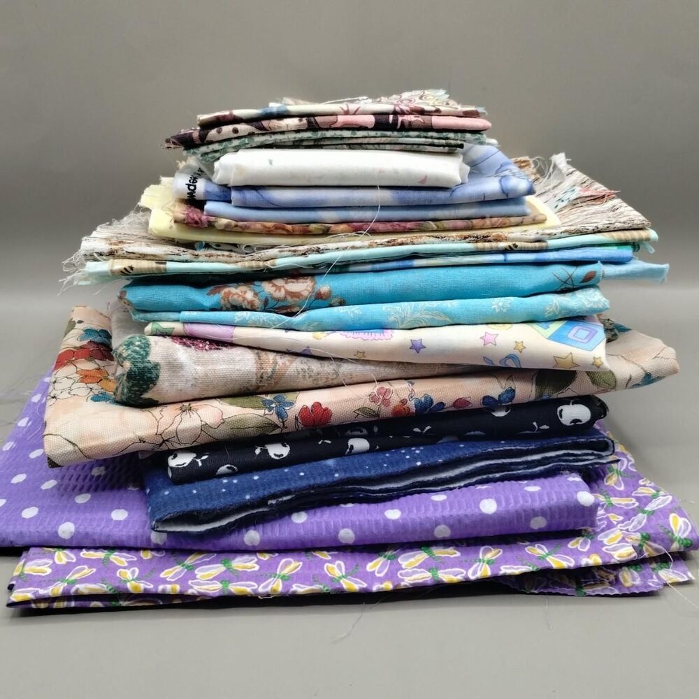Bundle Of Fabric for Sewing, Quilting, and Crafts.